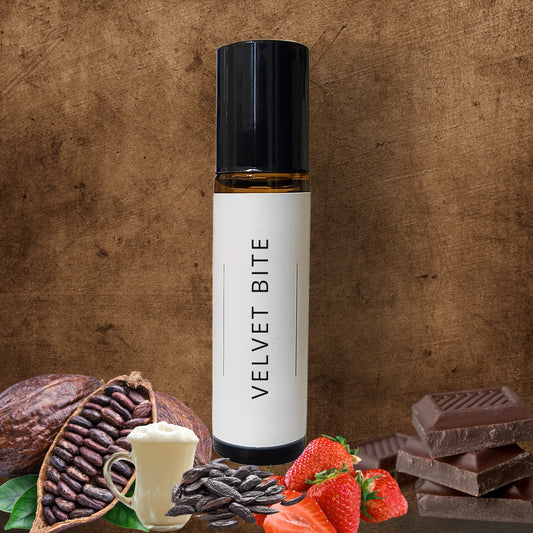 10ml Roll-on bottle labelled 'Velvet Bite' with cocoa beans, strawberries, and chocolate on a wooden background